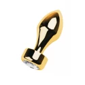 Gold anal plug TOYFA Metal with white round-shaped gem , length 7 cm, diameter 2-3,5 cm, weight 140 gr